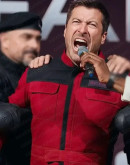 The Running Man Glen Powell Red Jacket
